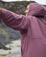 Woman wearing a Vivida sherpa weatherproof changing robe Purple Dusky Damson